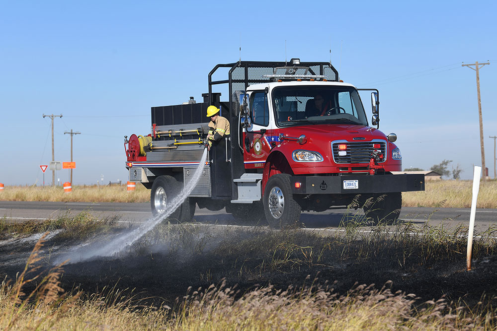 Pantex Firefighters extinguish a grass fire