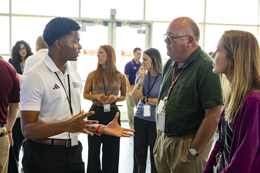 Pantex Communications Intern Michael Odie discusses his project at the 2026 Intern Expo.