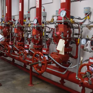 Carlos G., fire protection engineer, conducts a monthly prevention check on equipment. 